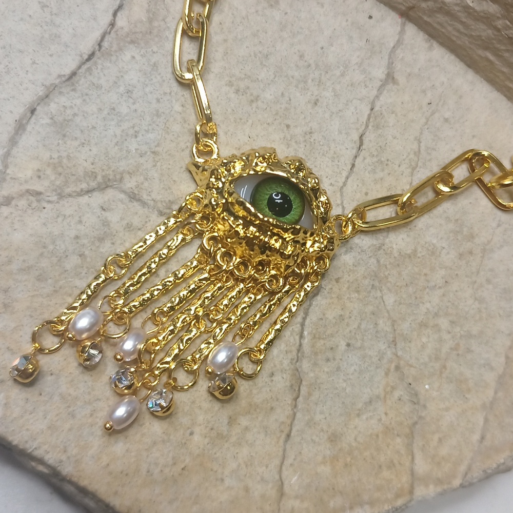 Eye-catching paperclip chain necklace with a green eye Pendant